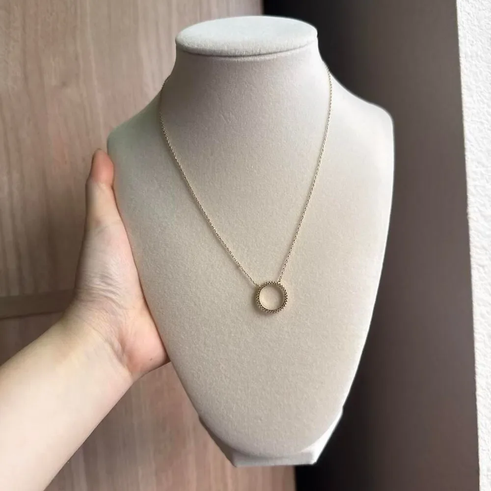 Source Unknown gold pendant